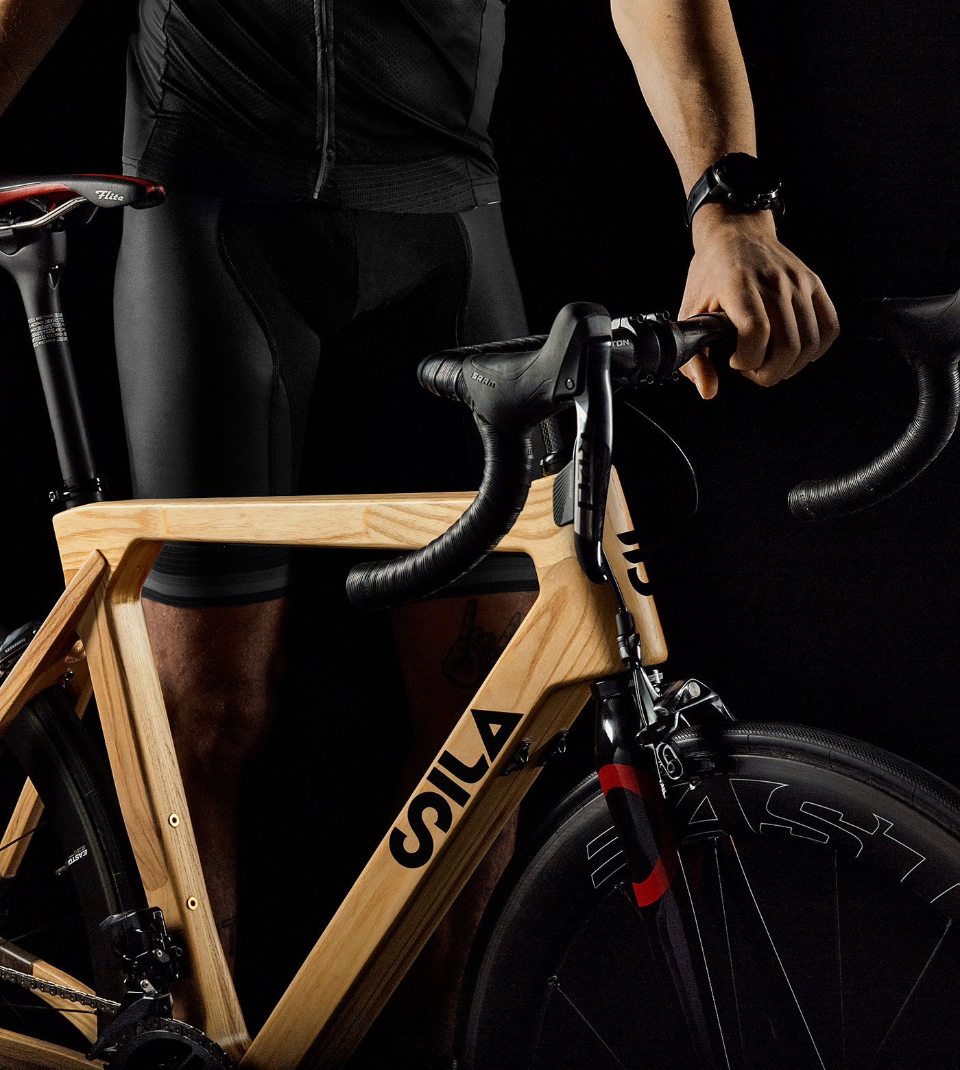 SILA wooden gravel bike with a cycling enthusiast